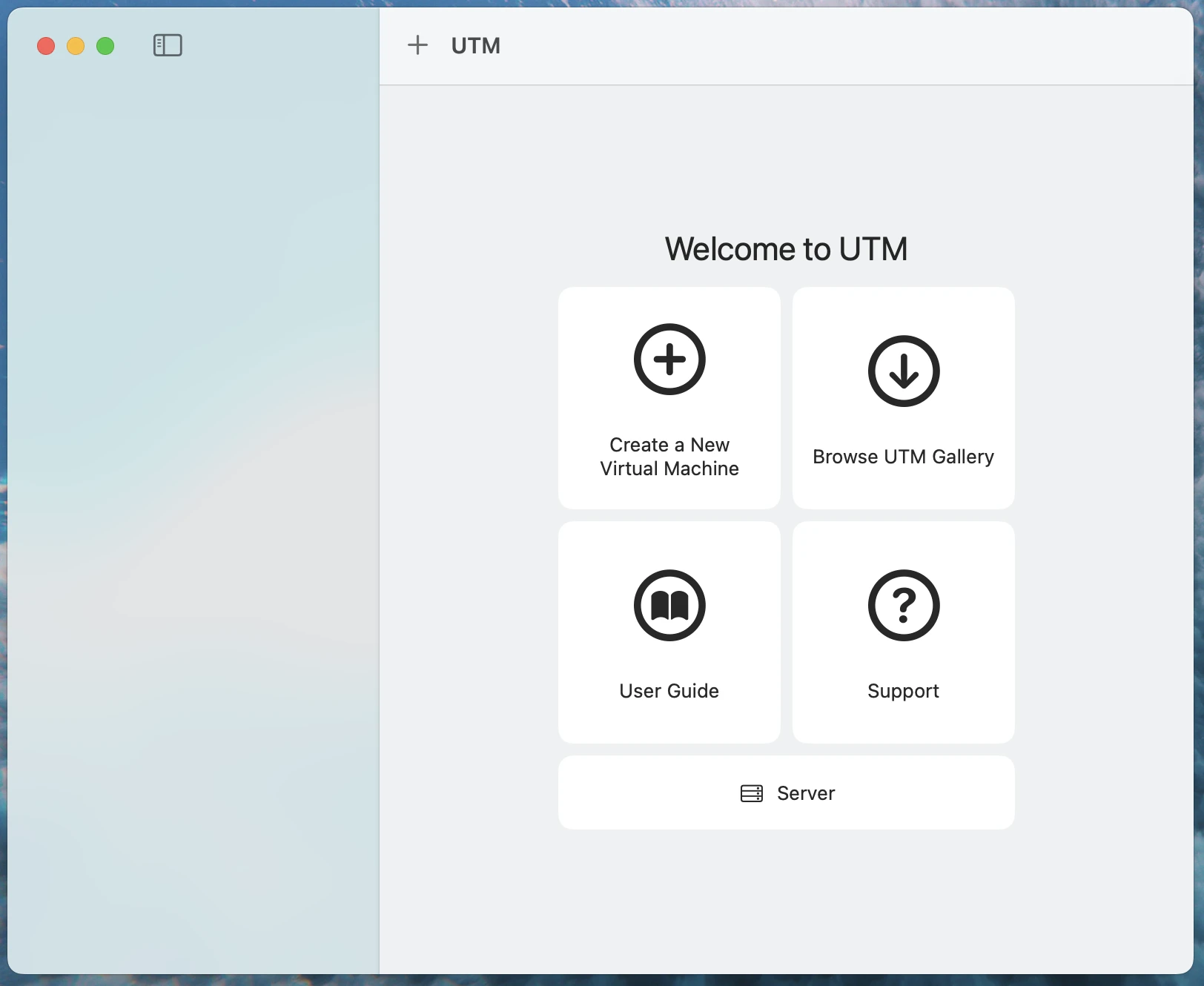 UTM 应用程序界面,显示带有用于创建新虚拟机的加号图标的主窗口 UTM 应用程序界面,显示带有用于创建新虚拟机的加号图标的主窗口